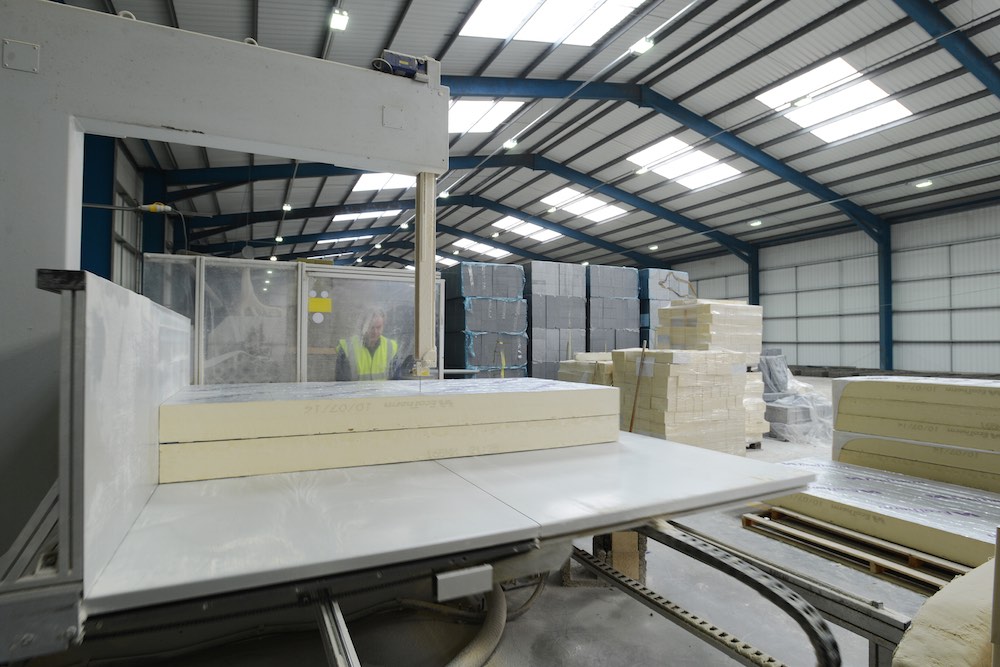 Benefits of woodcrete ICF. Photo of the manufacturing of Durisol Insulation